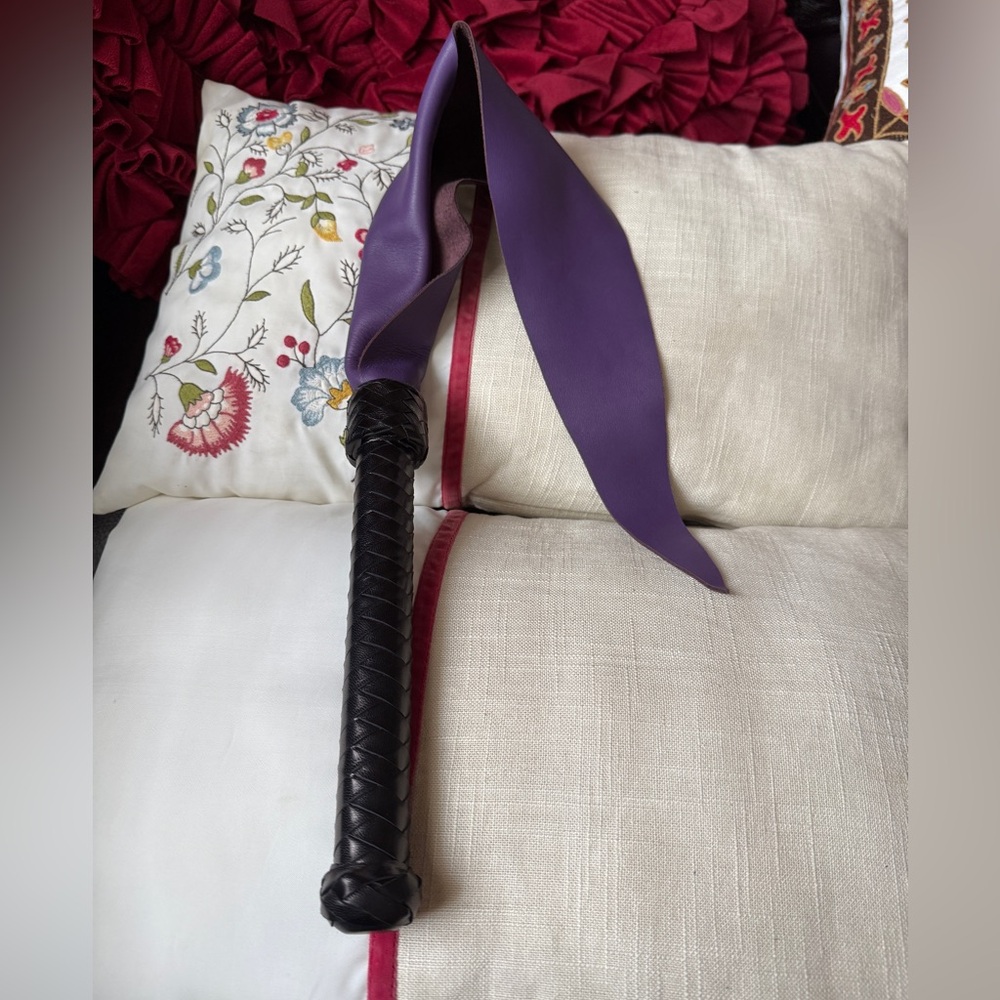 Elegant Black and Purple Decorative Whip